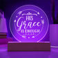 Round clear acrylic plaque with 'His Grace Is Enough' engraved on it. Illuminated with purple LED light